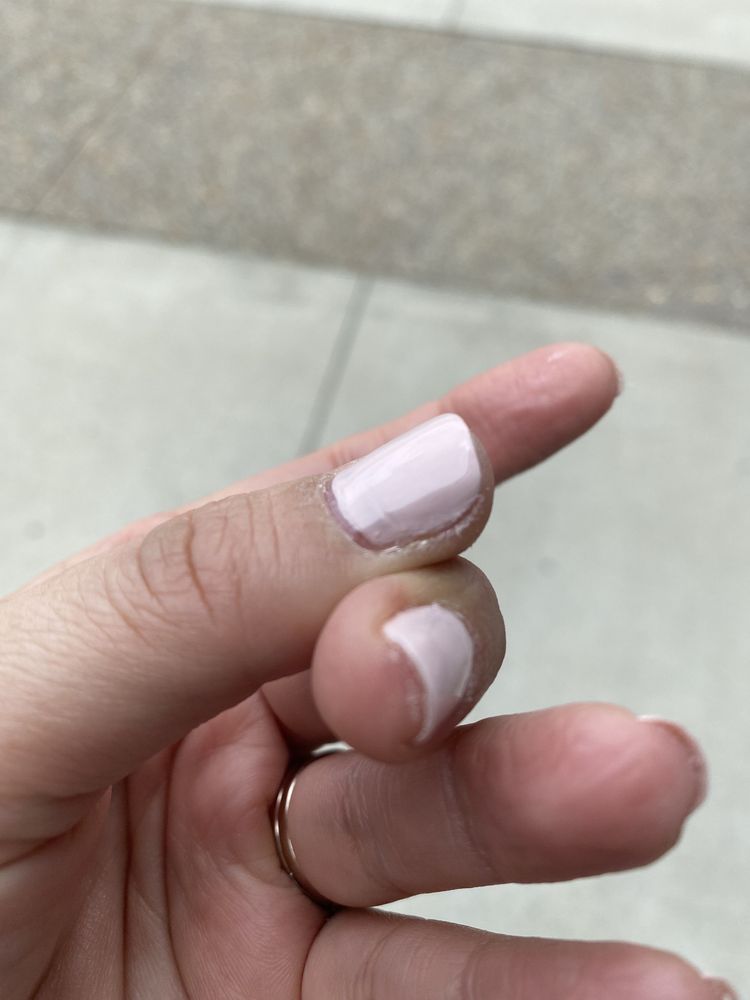 Close-up of pale nail polish