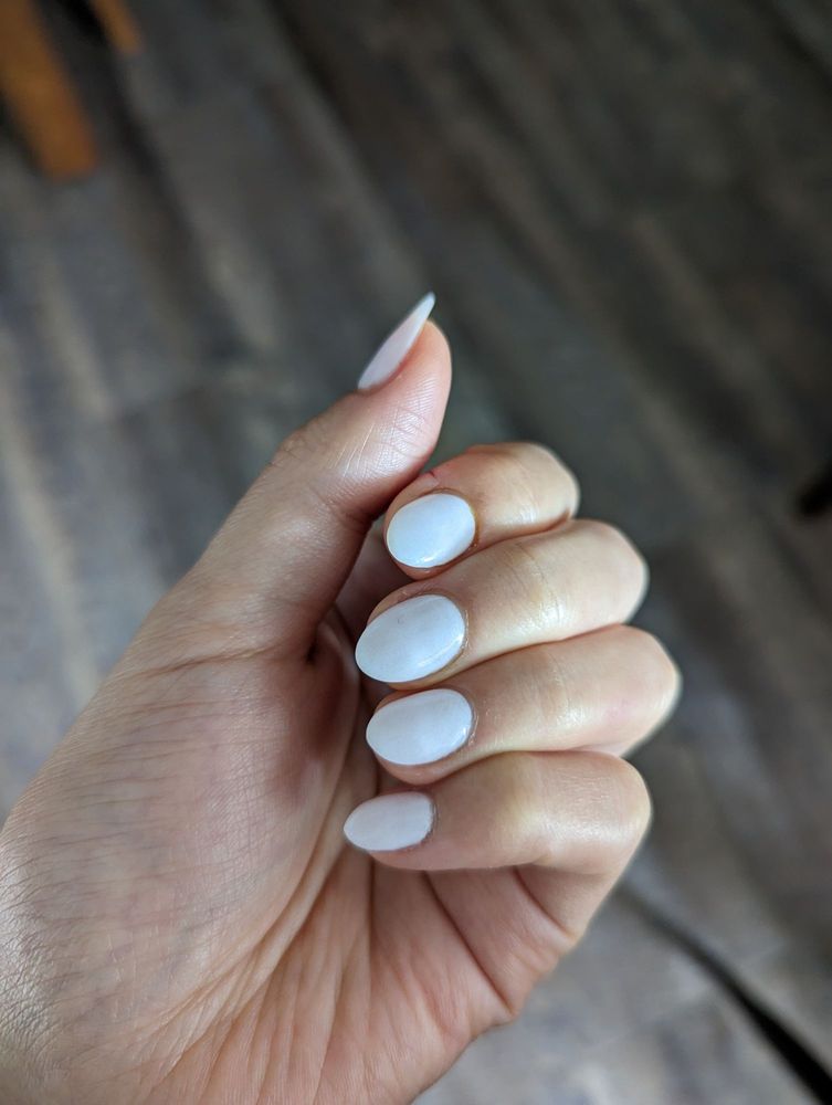 Pale polished nails